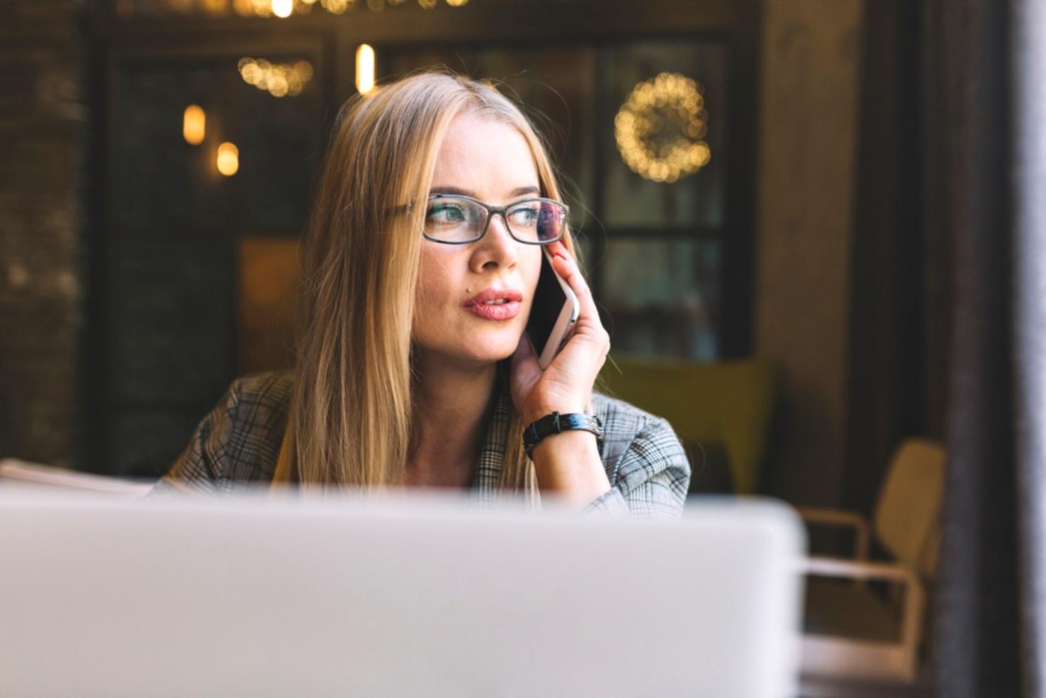 Mobile development workspace with planning materials and devices